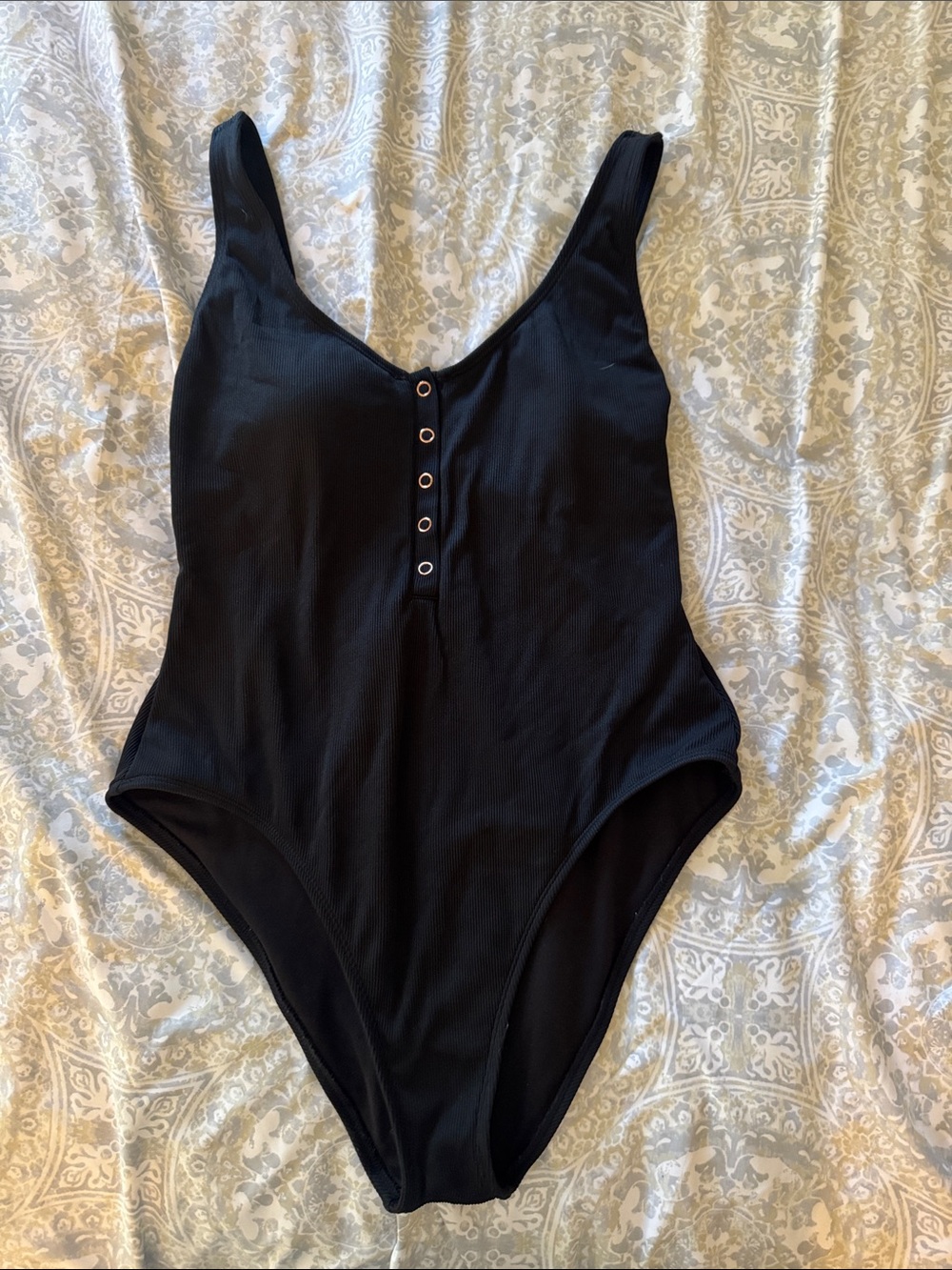 La Hearts Black Ribbed One-Piece with Snap Placket